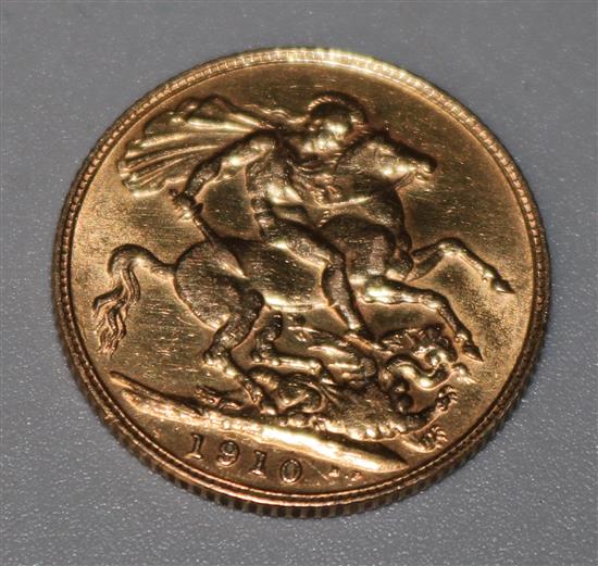 An Edward VII 1910 gold full sovereign.
